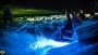 Watching a wakesurfer ride on a blue wake lit by LIFEFORM underwater led boat lights